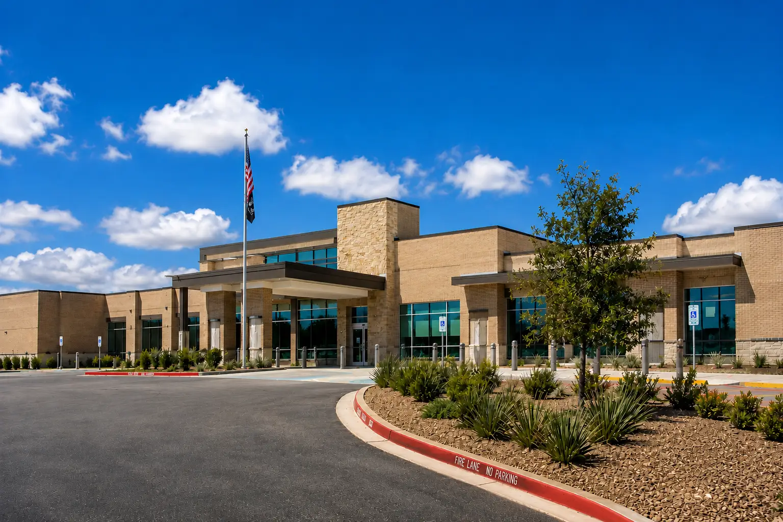 Commercial exterior with stone accents, warm wall finishes, and a covered entrance